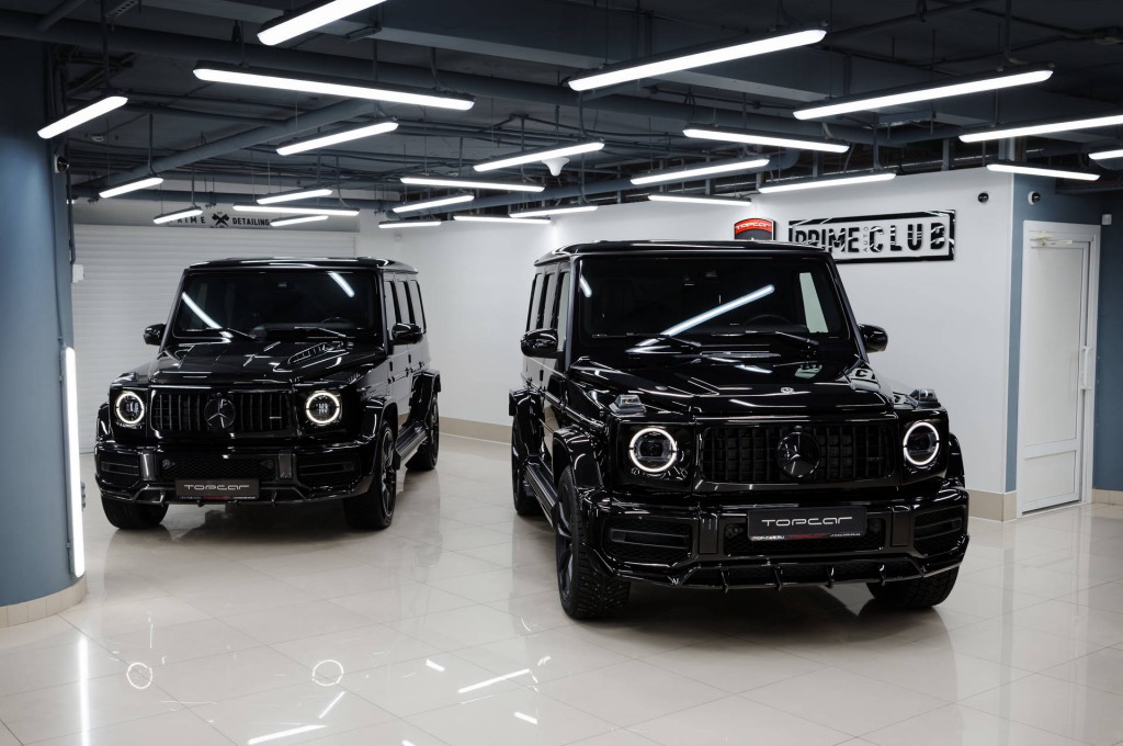 There are 2 black Mercedes Benz G63 AMG