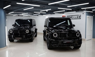 There are 2 black Mercedes Benz G63 AMG